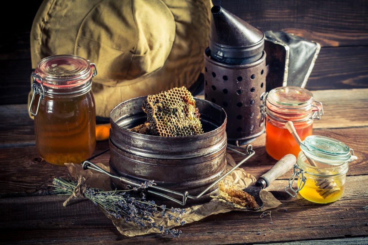 age-beekeeper-tools-in-countryside.jpg